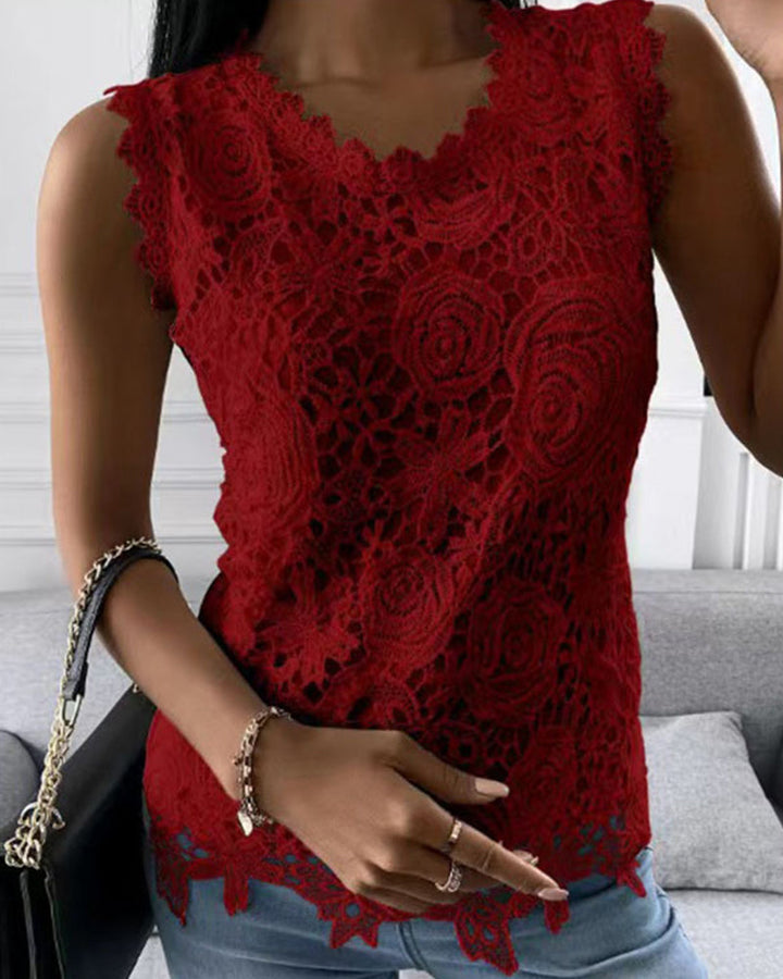 Ärmelloses Damen-Spitzentop mit zarten Details, lässig und elegant, in Weiß, ideal für vielseitige Outfits.