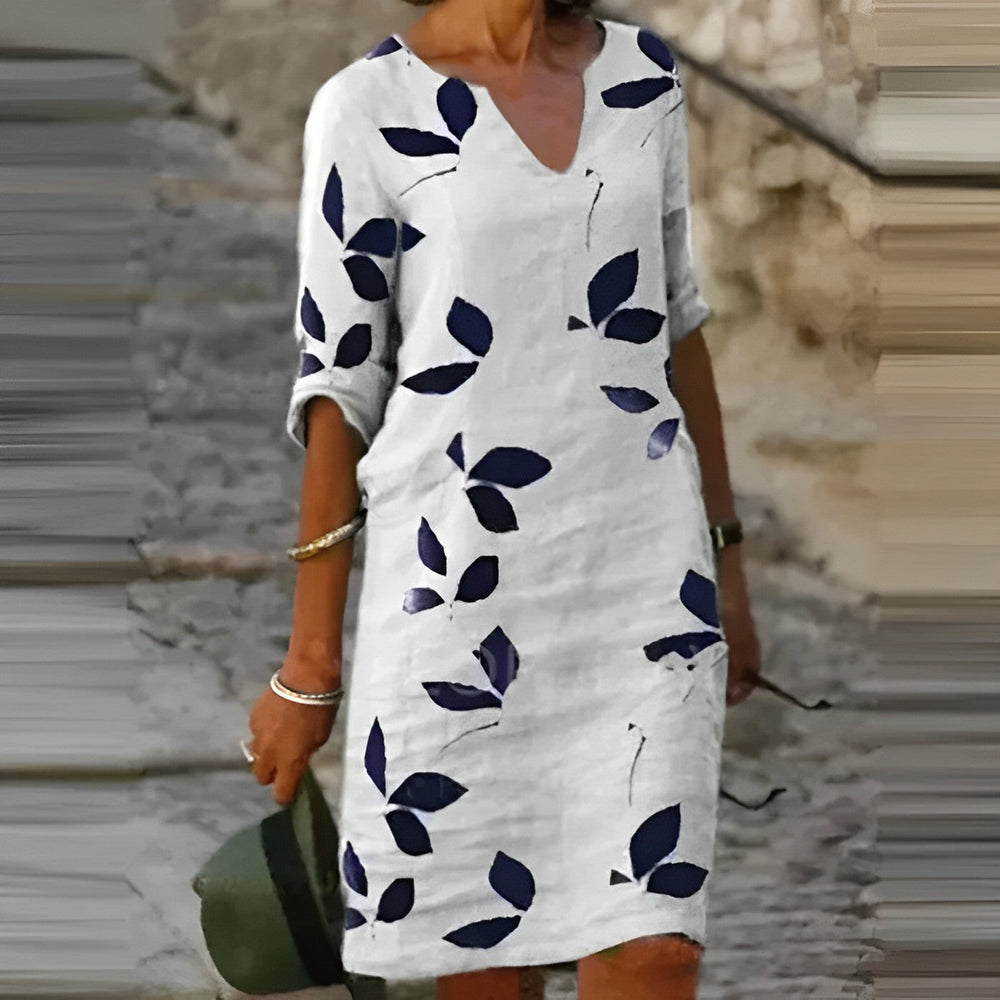"Atemberaubendes Damen-Sommerkleid mit Blätterdruck, elegant und leicht, perfekt für stilvolle Sommeranlässe."