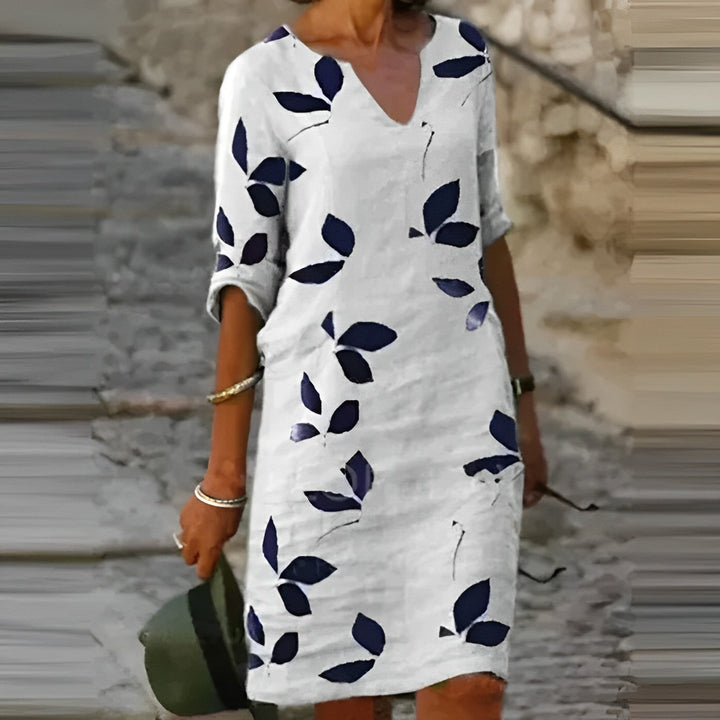 "Atemberaubendes Damen-Sommerkleid mit Blätterdruck, elegant und leicht, perfekt für stilvolle Sommeranlässe."