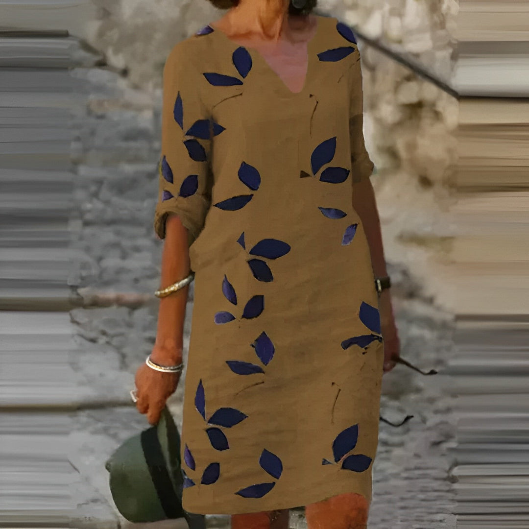 "Atemberaubendes Damen-Sommerkleid mit Blätterdruck, elegant und leicht, perfekt für stilvolle Sommeranlässe."