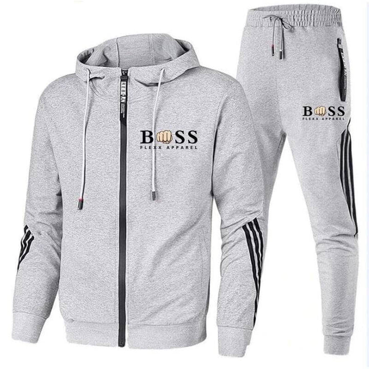 "Atmungsaktiver Herren Sportanzug, 2-teilig, Polyester, Regular Fit, sportlicher und moderner Look in Schwarz."