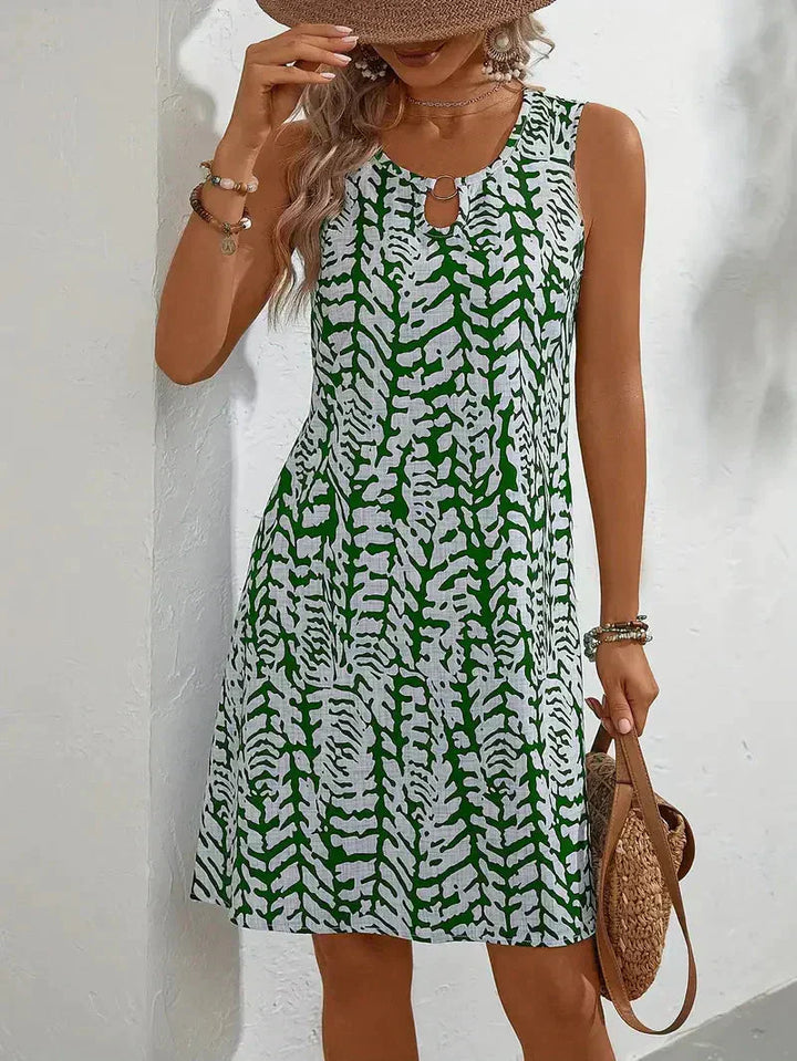 Bedrucktes ärmelloses Sommerkleid für Damen XL-5XL mit blumigem Muster, fließendem Schnitt, ideal für sonnige Tage.