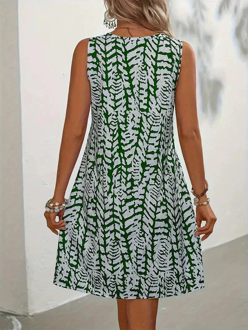Bedrucktes ärmelloses Sommerkleid für Damen XL-5XL mit blumigem Muster, fließendem Schnitt, ideal für sonnige Tage.