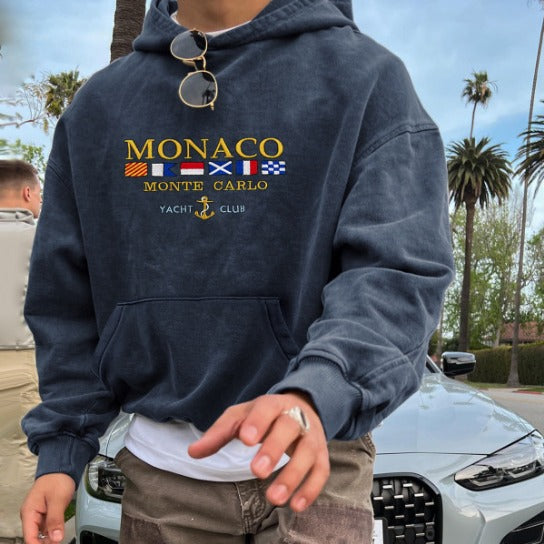 "Blauer Luxus Herren Hoodie mit edler Monaco Monte Carlo Yacht Club-Stickerei, aus hochwertigen Materialien gefertigt."