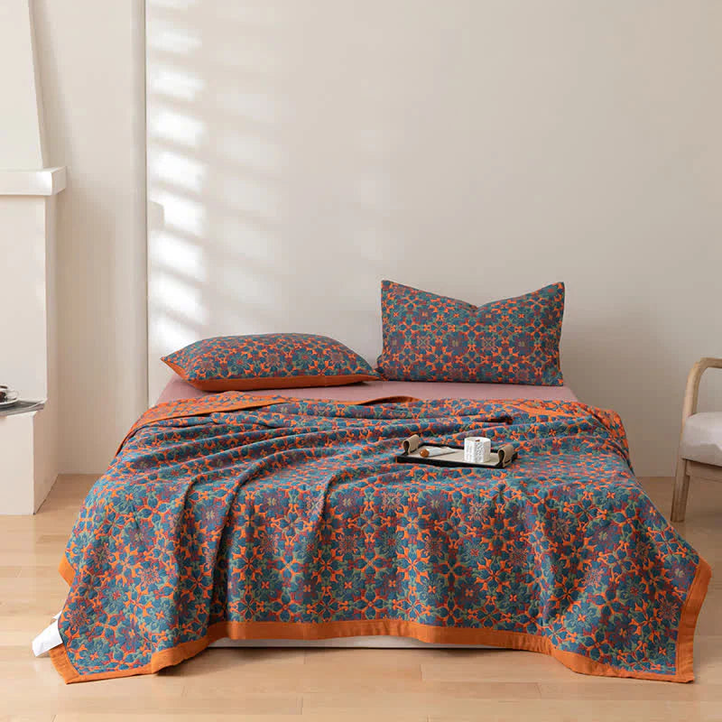 "Blauer Quilt mit sechs Baumwollschichten und kunstvollem Muster für stilvolle Wohnraumgestaltung und angenehme Wärme."