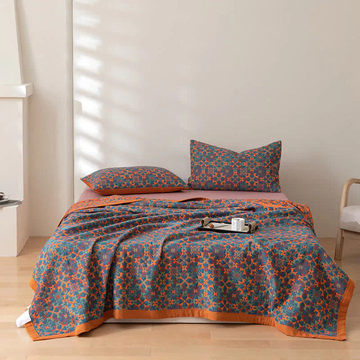 "Blauer Quilt mit sechs Baumwollschichten und kunstvollem Muster für stilvolle Wohnraumgestaltung und angenehme Wärme."