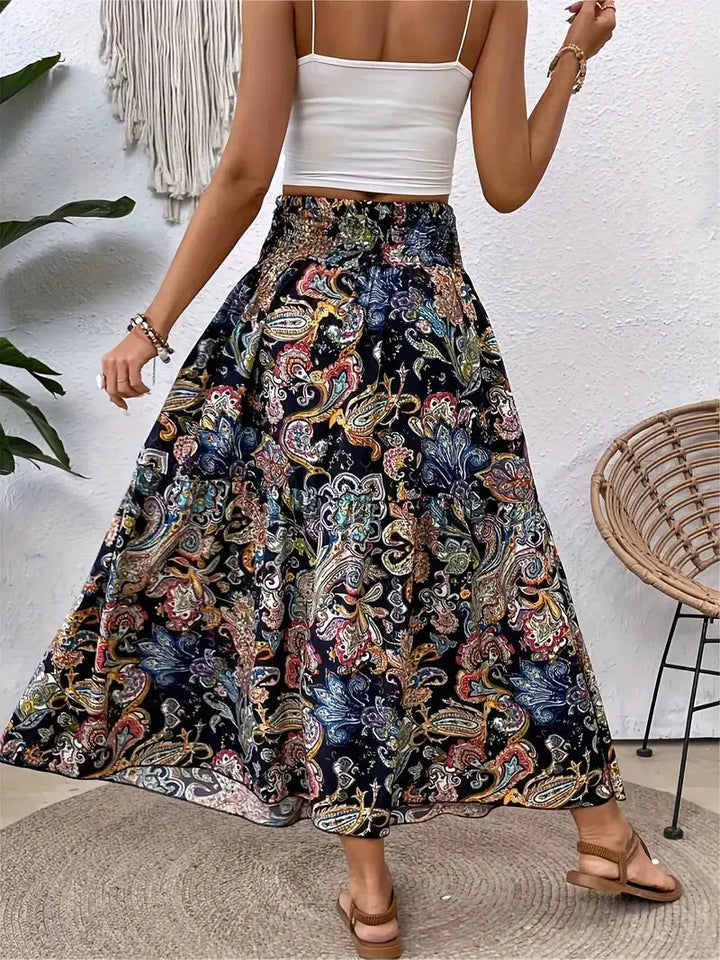 Boho Maxirock Damen, fließend mit Muster und raffinierter Taille, für elegante Looks in Schwarz, Rot oder Braun.