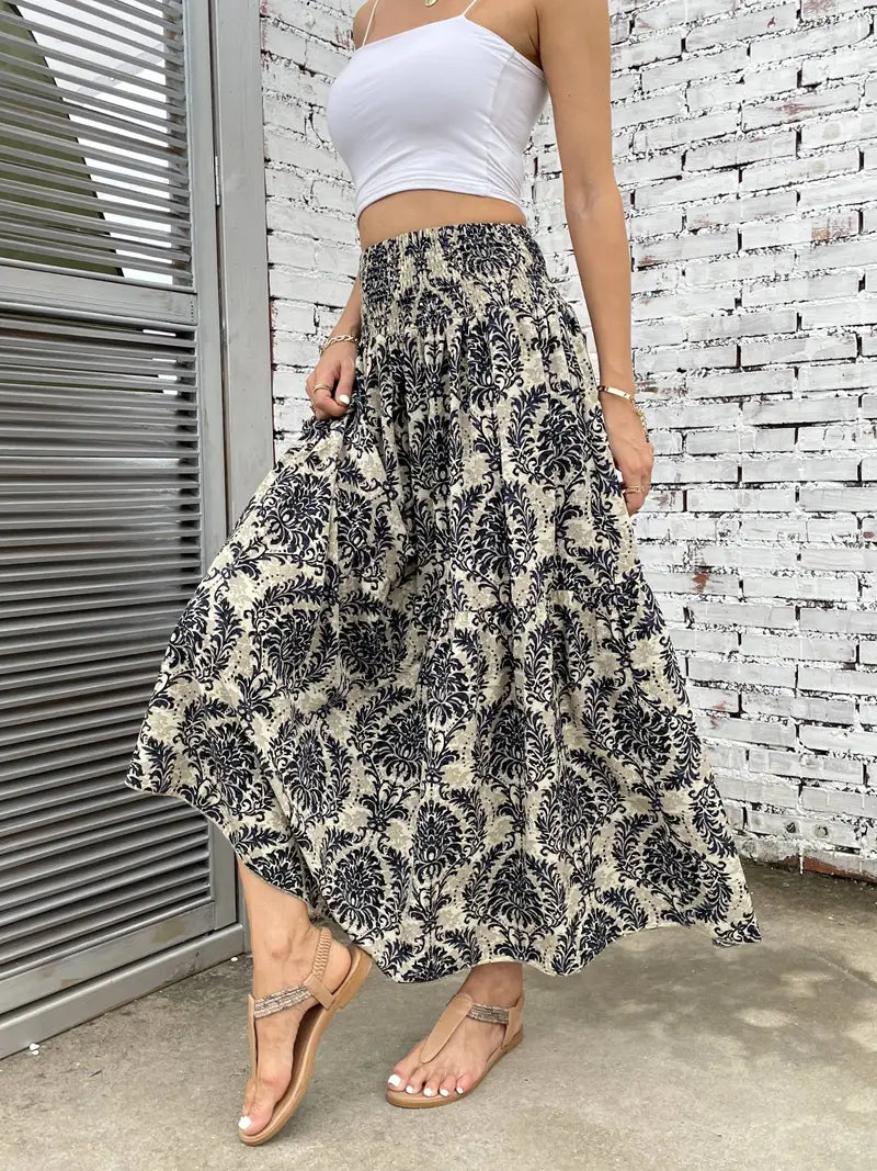 Boho Maxirock Damen, fließend mit Muster und raffinierter Taille, für elegante Looks in Schwarz, Rot oder Braun.