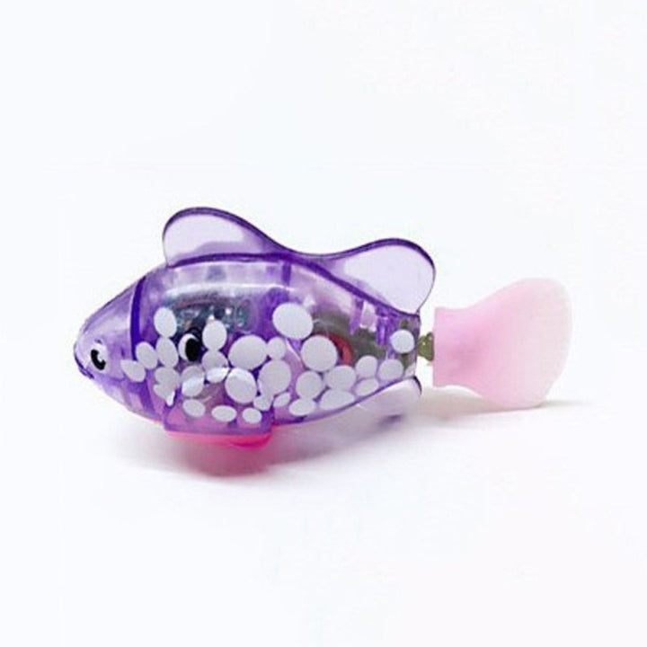 "Bunte, leuchtende Fisch-Spielzeuge in einem Glas, die lebensechte Bewegungen zeigen und das Jagdverhalten stimulieren."