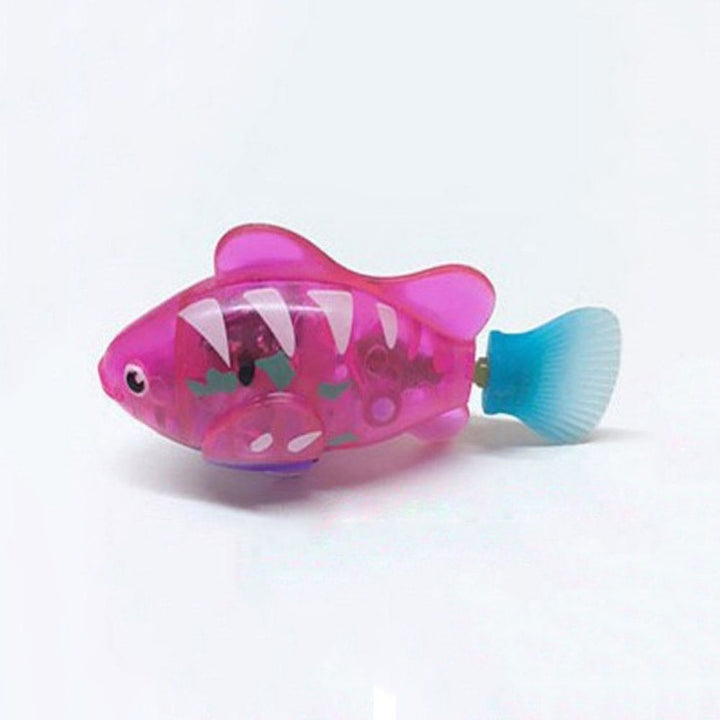 "Bunte, leuchtende Fisch-Spielzeuge in einem Glas, die lebensechte Bewegungen zeigen und das Jagdverhalten stimulieren."