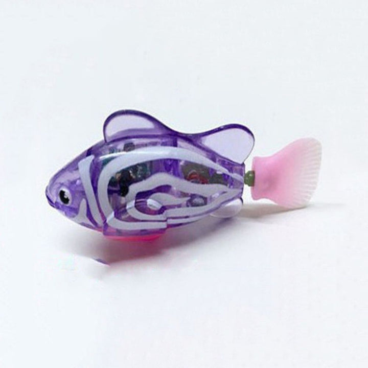 "Bunte, leuchtende Fisch-Spielzeuge in einem Glas, die lebensechte Bewegungen zeigen und das Jagdverhalten stimulieren."