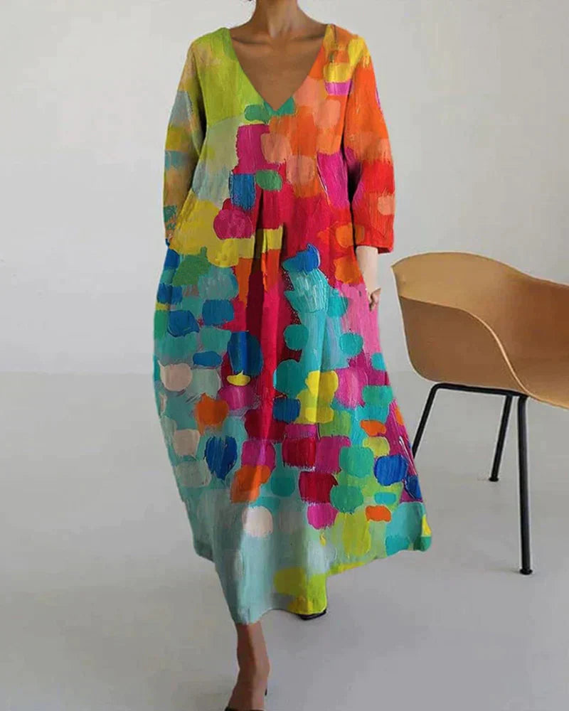 "Buntes Leinen-Sommerkleid für Damen, lebendige Prints, figurschmeichelnde Passform, ideal für sonnige Tage."