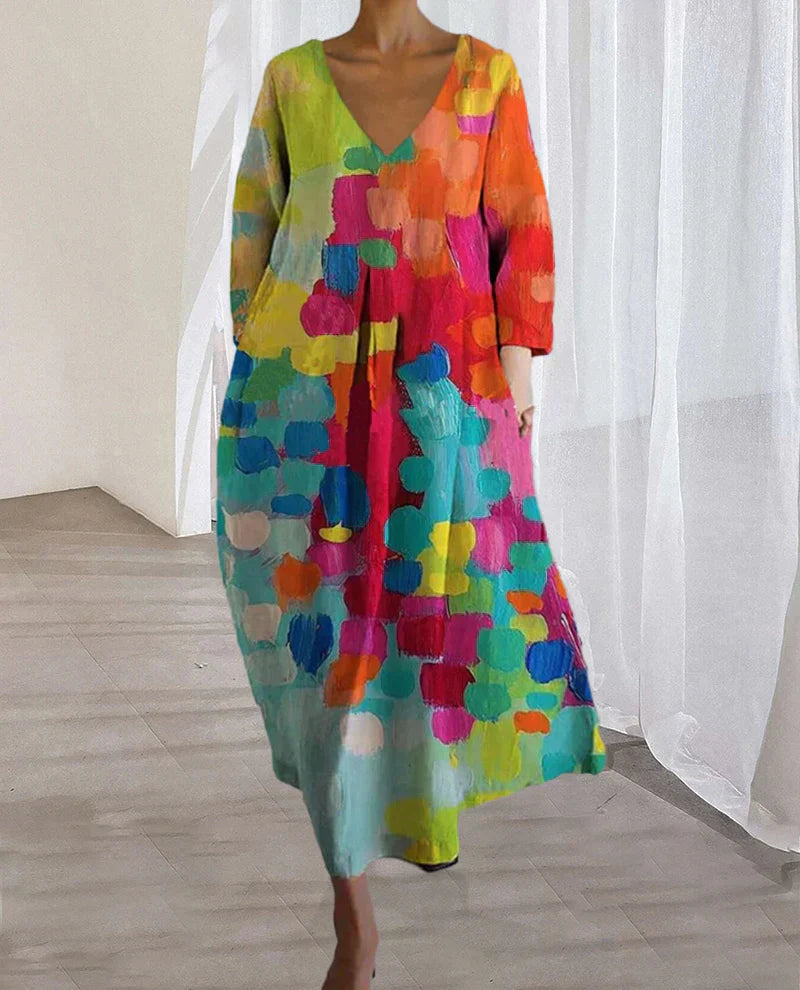 "Buntes Leinen-Sommerkleid für Damen, lebendige Prints, figurschmeichelnde Passform, ideal für sonnige Tage."