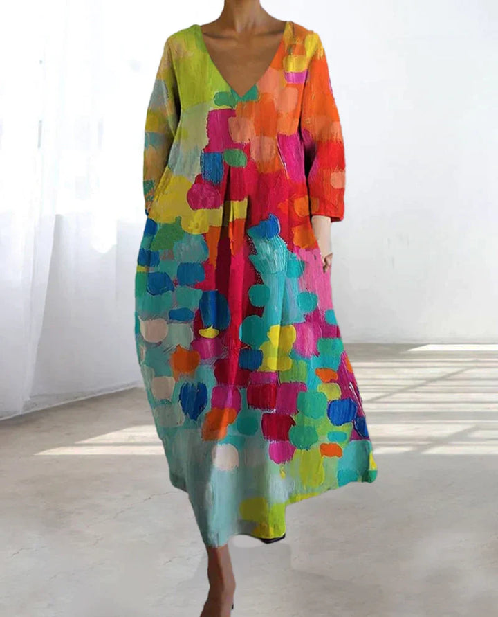 "Buntes Leinen-Sommerkleid für Damen, lebendige Prints, figurschmeichelnde Passform, ideal für sonnige Tage."