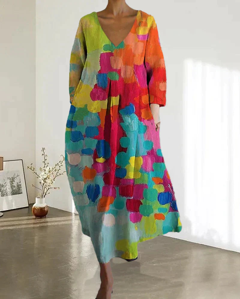"Buntes Leinen-Sommerkleid für Damen, lebendige Prints, figurschmeichelnde Passform, ideal für sonnige Tage."
