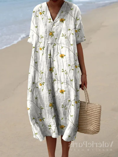 Buntes Sommerkleid mit Blumenmuster, leichte Eleganz, knielang, luftiger Stoff, ideal für warme Tage und sommerliche Events.