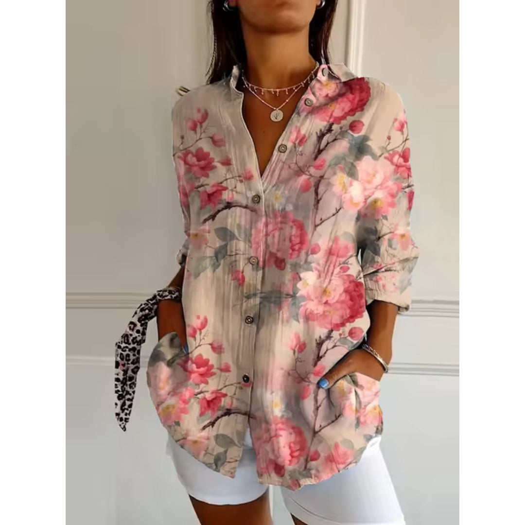 "Damen Blumenshirt mit zartem Blumenmuster, Knopfleiste und langen Ärmeln, ideal für elegante und lässige Anlässe."