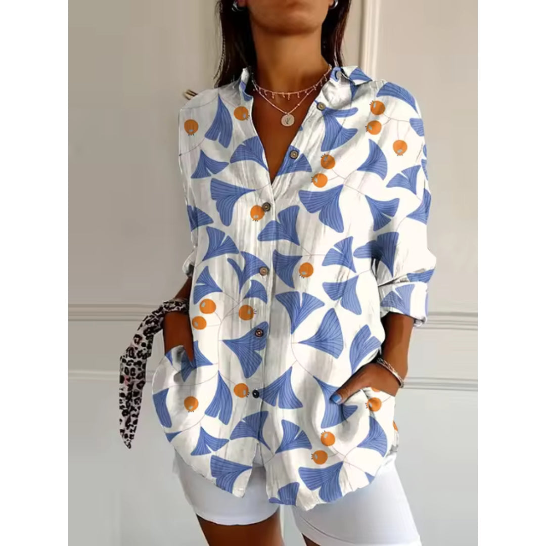 "Damen Blumenshirt mit zartem Blumenmuster, Knopfleiste und langen Ärmeln, ideal für elegante und lässige Anlässe."