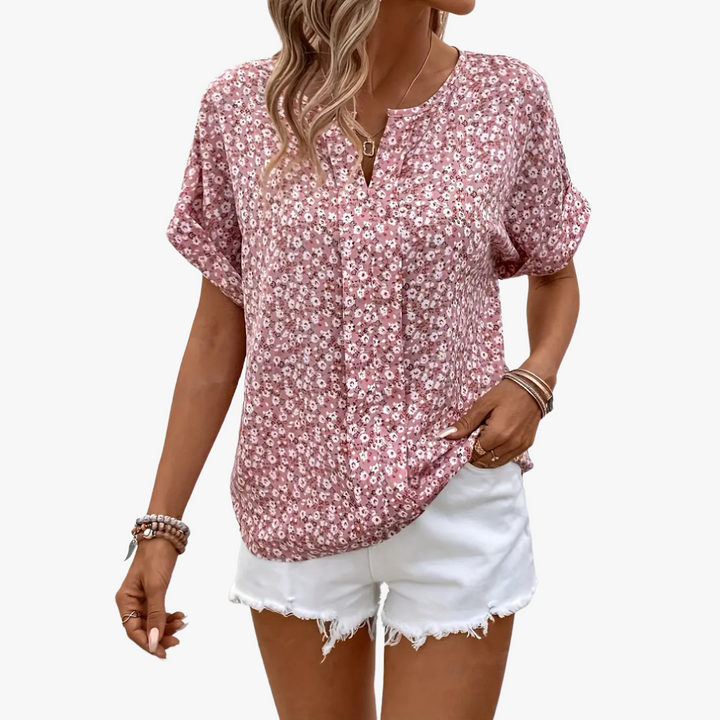 "Damen Bluse mit Blumendruck, vintage Stil, elegante Passform, weicher Stoff, perfekt für Büro oder besondere Anlässe."