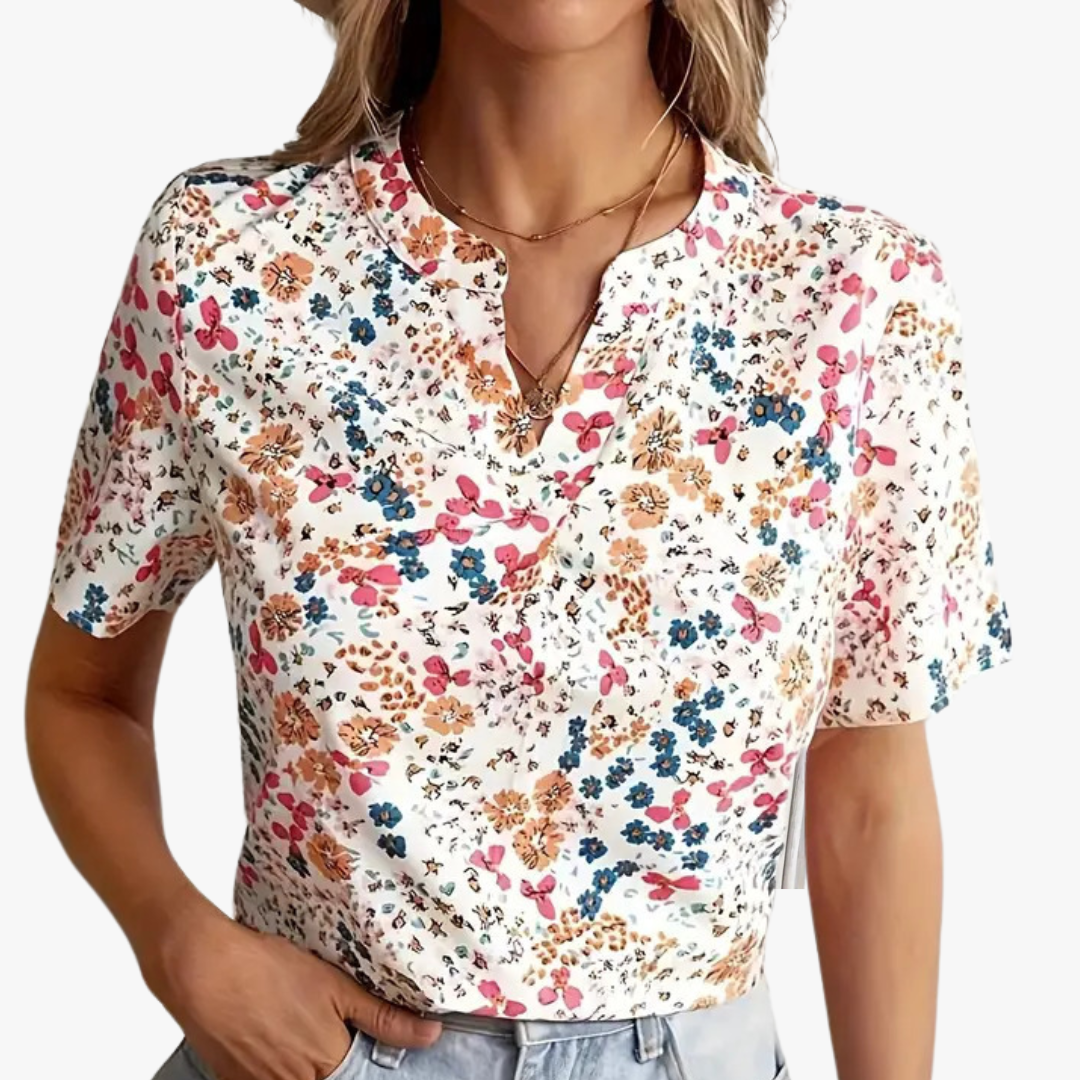 "Damen Bluse mit Blumendruck, vintage Stil, elegante Passform, weicher Stoff, perfekt für Büro oder besondere Anlässe."