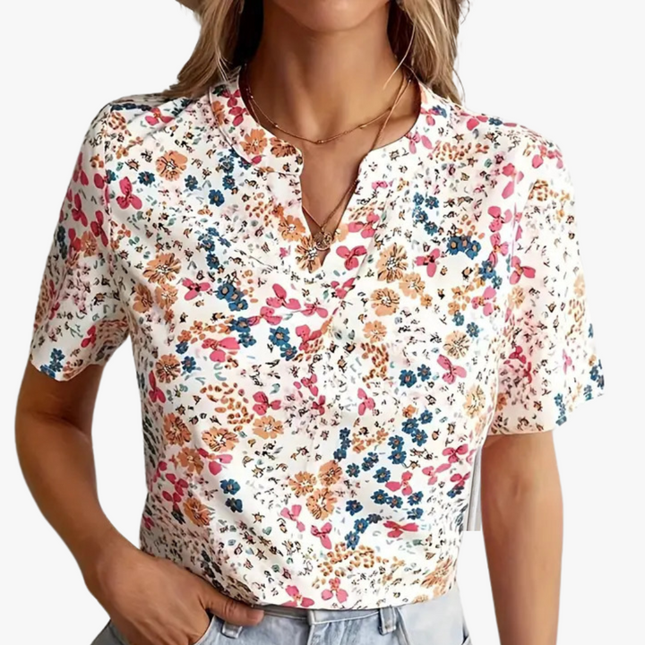 "Damen Bluse mit Blumendruck, vintage Stil, elegante Passform, weicher Stoff, perfekt für Büro oder besondere Anlässe."