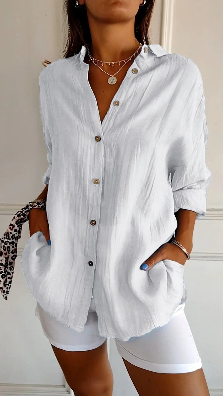 Damen Button-Down Hemd, leicht und atmungsaktiv, weiß, perfekt für Sommer, vielseitiges Styling mit Röcken oder Jeans.