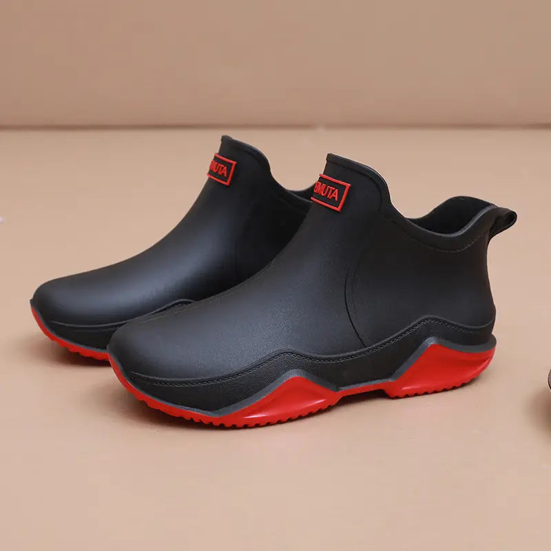 "Damen Gummistiefel: Wasserdicht, elegant, trendig, schwarzes Design, ideal für Regenwetter und Outdoor-Aktivitäten."