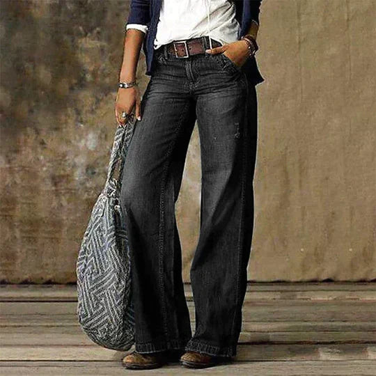 "Damen Jeans mit weitem Bein, grauer Retro-Look, urbaner Stil, vorne und seitlich, bequemer Schnitt, niedrigere Taille."