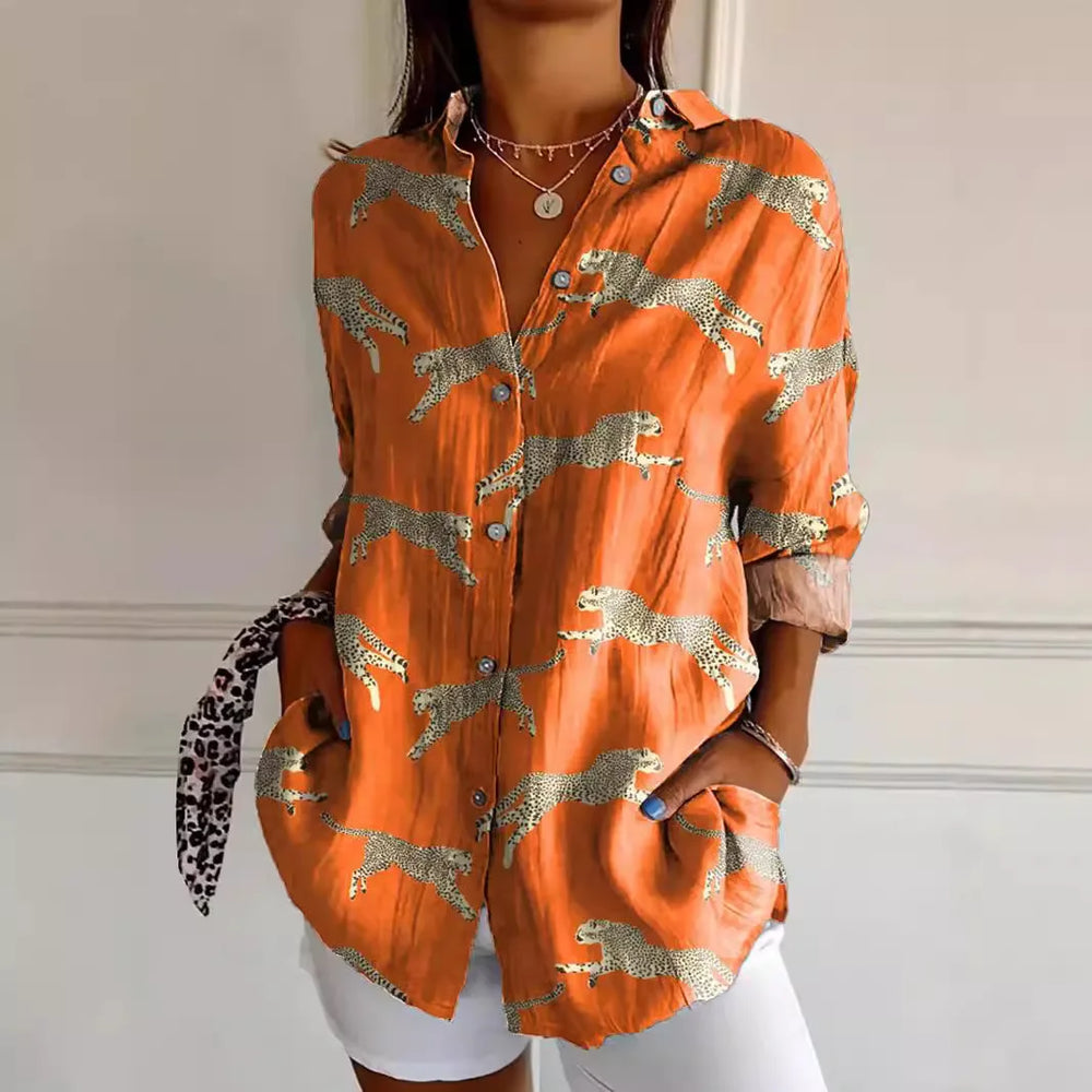 Damen Langarm Bluse mit floralem Muster, klassischem Kragen und luftigem Stoff, ideal für sommerliche Eleganz und Komfort.