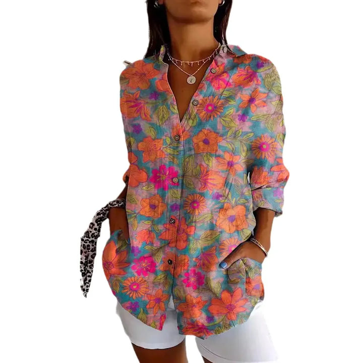Damen Langarm Bluse mit floralem Muster, klassischem Kragen und luftigem Stoff, ideal für sommerliche Eleganz und Komfort.