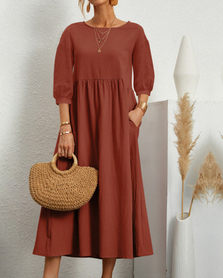 "Damen Midi Kleid mit 3/4 Ärmeln, Rundhalsausschnitt, elegant, vielseitig, in vier dezenten Farben erhältlich."