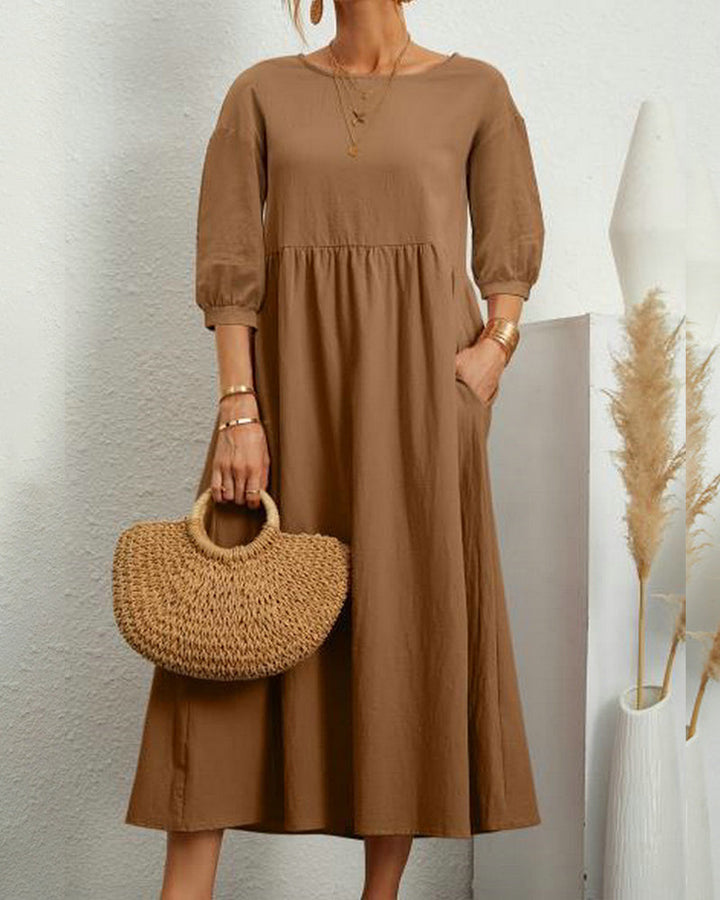 "Damen Midi Kleid mit 3/4 Ärmeln, Rundhalsausschnitt, elegant, vielseitig, in vier dezenten Farben erhältlich."