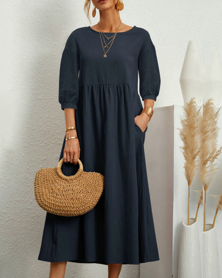 "Damen Midi Kleid mit 3/4 Ärmeln, Rundhalsausschnitt, elegant, vielseitig, in vier dezenten Farben erhältlich."