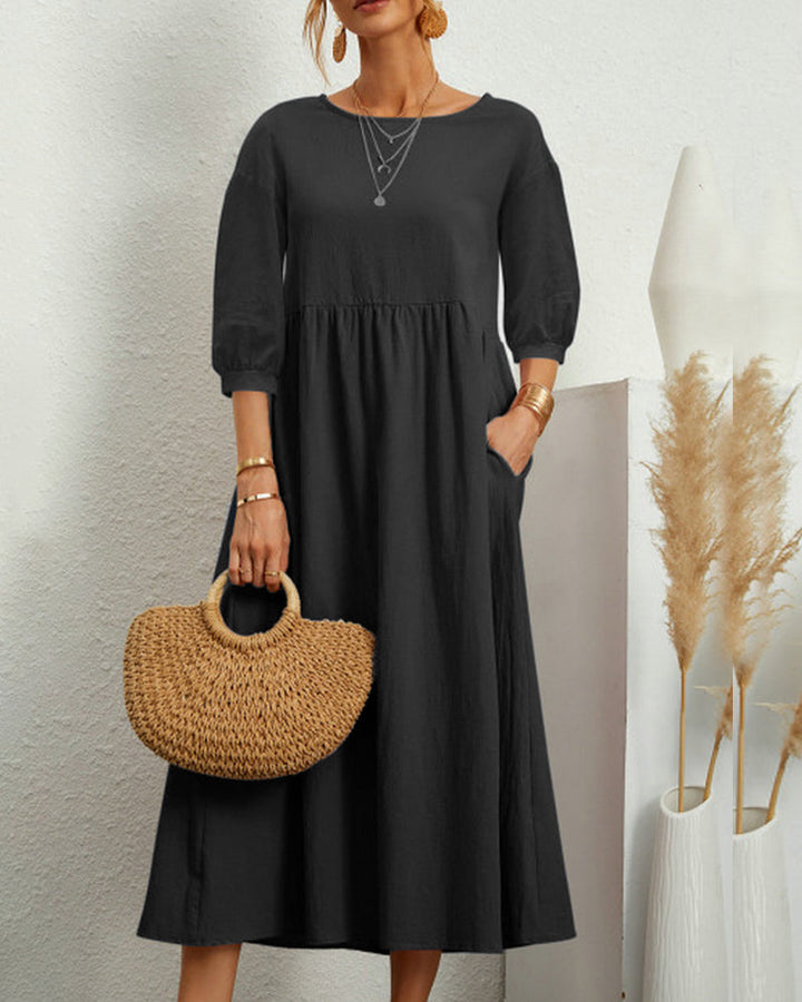 "Damen Midi Kleid mit 3/4 Ärmeln, Rundhalsausschnitt, elegant, vielseitig, in vier dezenten Farben erhältlich."