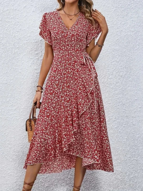 "Damen Midi Kleid mit V-Ausschnitt, florales Design, fließender Stoff, feminin und stilvoll für sonnige Tage."