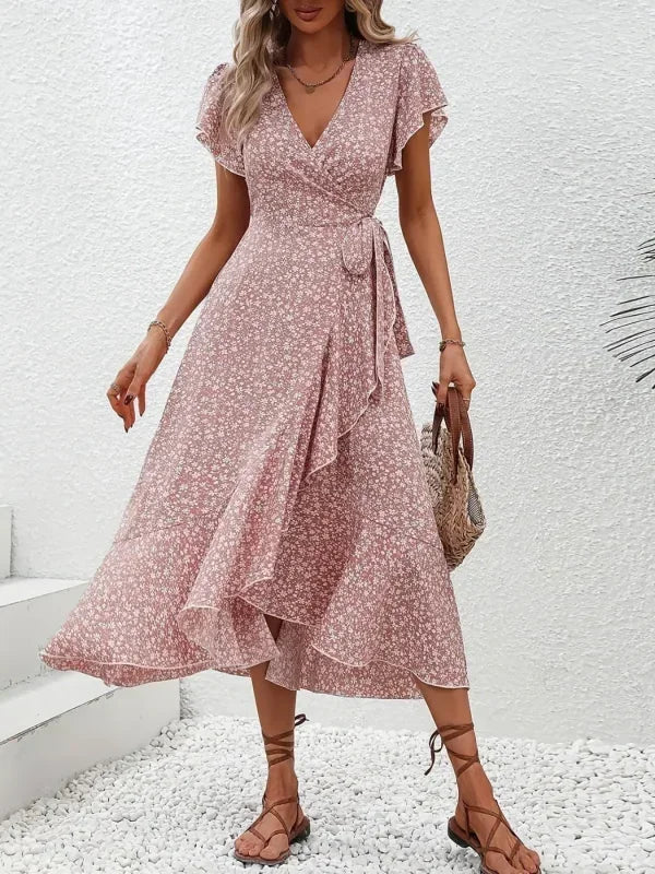 "Damen Midi Kleid mit V-Ausschnitt, florales Design, fließender Stoff, feminin und stilvoll für sonnige Tage."
