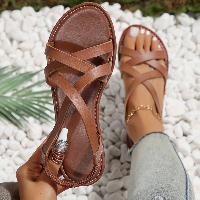 "Damen Sandalen mit Kreuzverschluss, stilvoll und bequem, ideal für Alltag und Anlässe, in beige, dunkelbraun, schwarz."