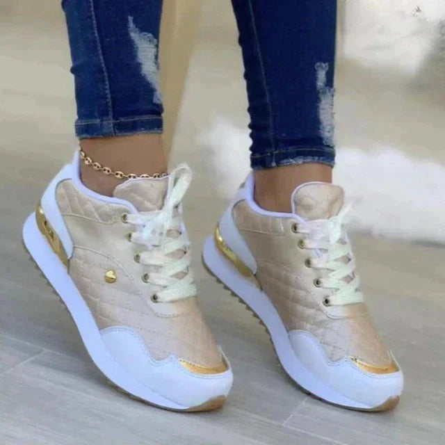 "Damen-Sneaker mit rutschsicherer Sohle und modernem Design in Aprikose, ideal für Komfort und Stil im Alltag."
