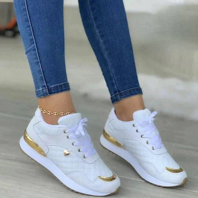 "Damen-Sneaker mit rutschsicherer Sohle und modernem Design in Aprikose, ideal für Komfort und Stil im Alltag."