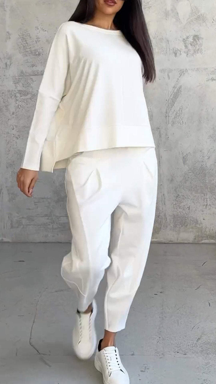 "Damen Sommer Outfit: Langarmshirt und Hose in schlichtem Design, lässig und stilvoll, ideal für Freizeit und Sommer."