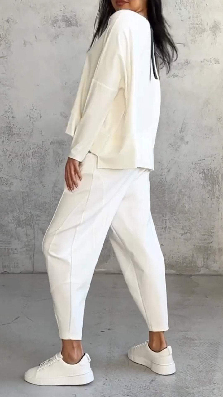 "Damen Sommer Outfit: Langarmshirt und Hose in schlichtem Design, lässig und stilvoll, ideal für Freizeit und Sommer."
