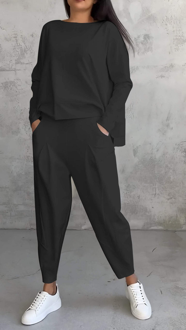 "Damen Sommer Outfit: Langarmshirt und Hose in schlichtem Design, lässig und stilvoll, ideal für Freizeit und Sommer."