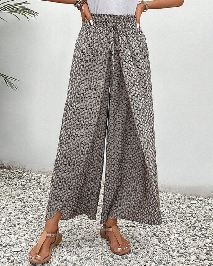 Damen-Sommerhose mit geometrischem Muster, hoher Taille, betont die Figur, ideal für eleganten und bequemen Alltagslook.