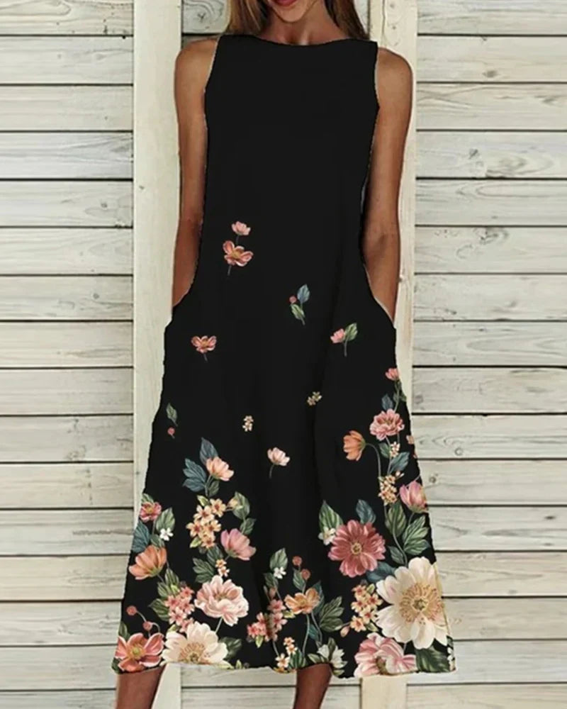 Damen Sommerkleid mit Blumenmuster, A-Linie, Midi-Länge, lebendig floral, ideal für sommerliche Anlässe, feminine Passform.