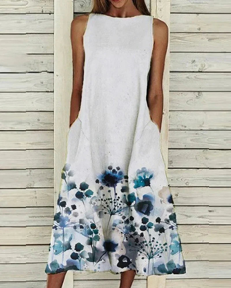 Damen Sommerkleid mit Blumenmuster, A-Linie, Midi-Länge, lebendig floral, ideal für sommerliche Anlässe, feminine Passform.