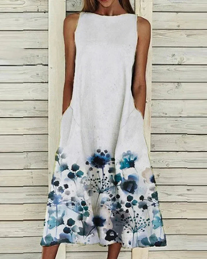 Damen Sommerkleid mit Blumenmuster, A-Linie, Midi-Länge, lebendig floral, ideal für sommerliche Anlässe, feminine Passform.