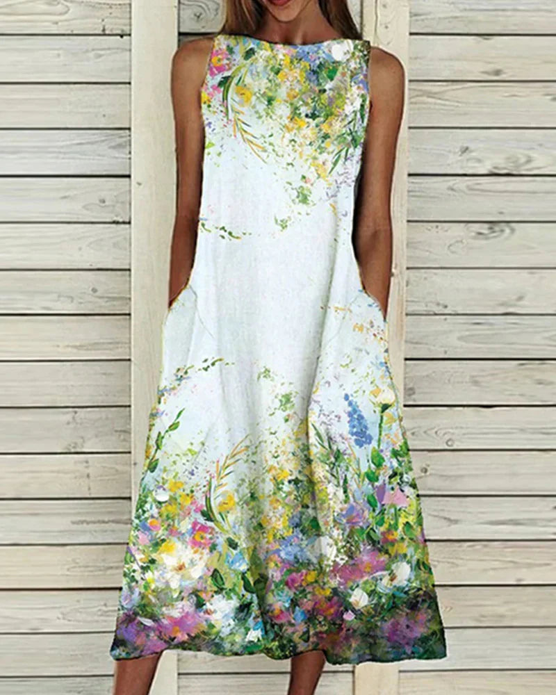 Damen Sommerkleid mit Blumenmuster, A-Linie, Midi-Länge, lebendig floral, ideal für sommerliche Anlässe, feminine Passform.