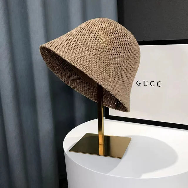 "Damen Sonnenhut, atmungsaktiv, elegant, mit breitem Rand für UV-Schutz, durchbrochenes Design, ideal für sonnige Tage."