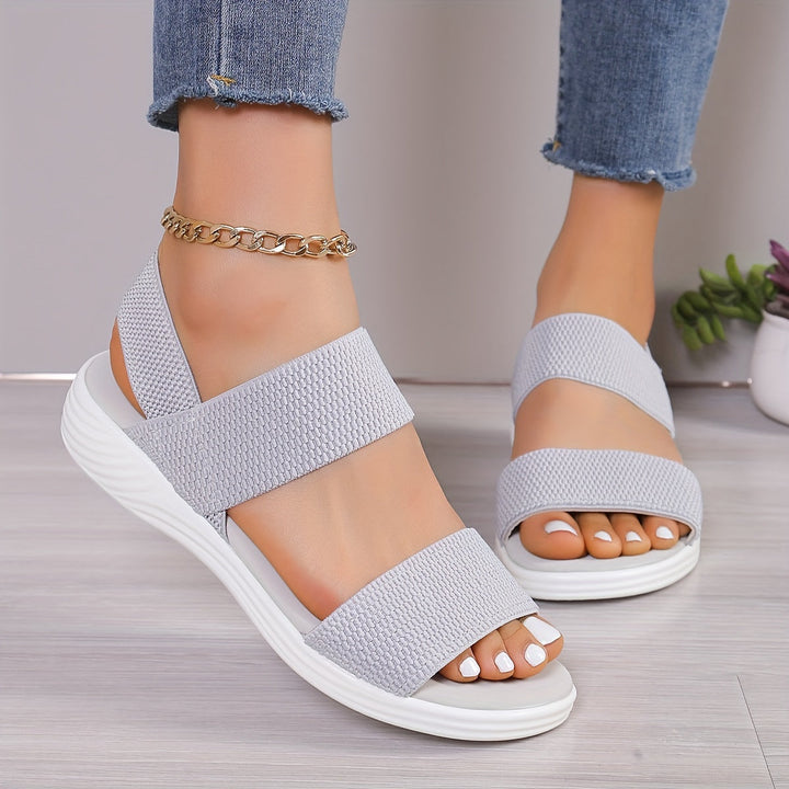 Damen-Stretch-Sandalen, elegant und leicht, in braunem Obermaterial. Perfekt für Komfort und stilvollen Alltagslook.