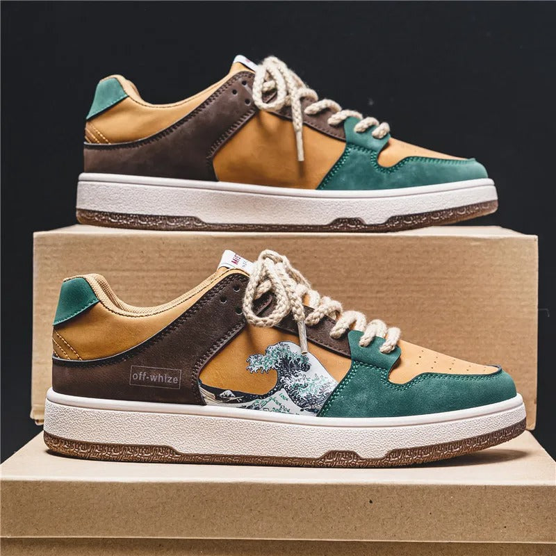 "Damen und Herren Sneakers mit blauem Wellendesign, ideal für sportliche Aktivitäten und stilvolle Alltagslooks."